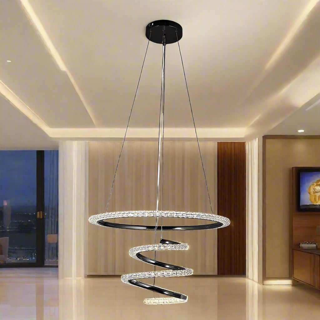 Spiral pendant light with crystal accents on a white background