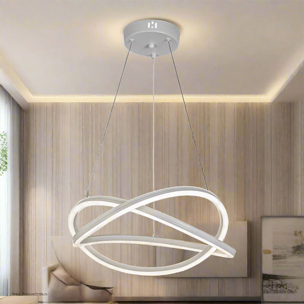 Modern pendant light with two interlocking circular designs on a white background