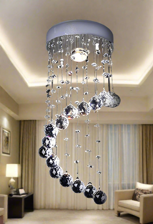 Crystal chandelier with hanging beads on a black background