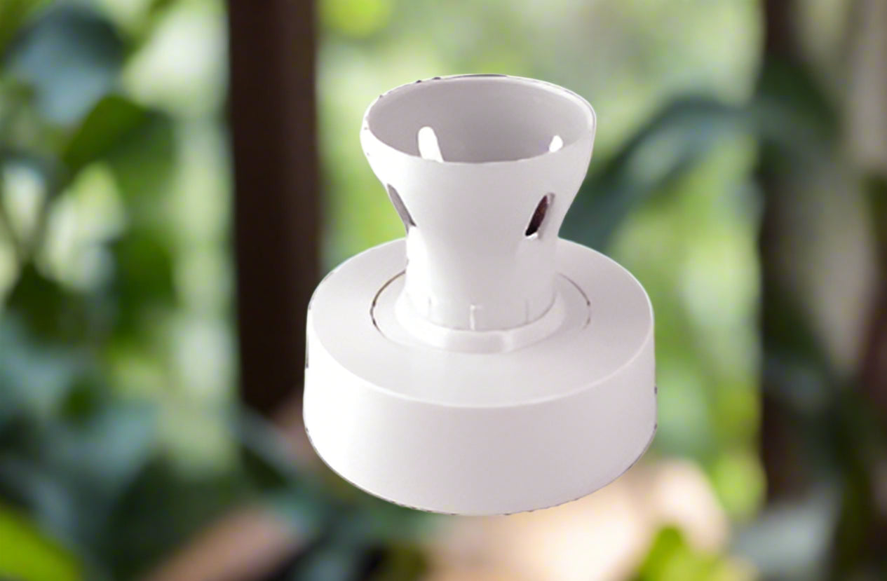 White plastic component on a white background