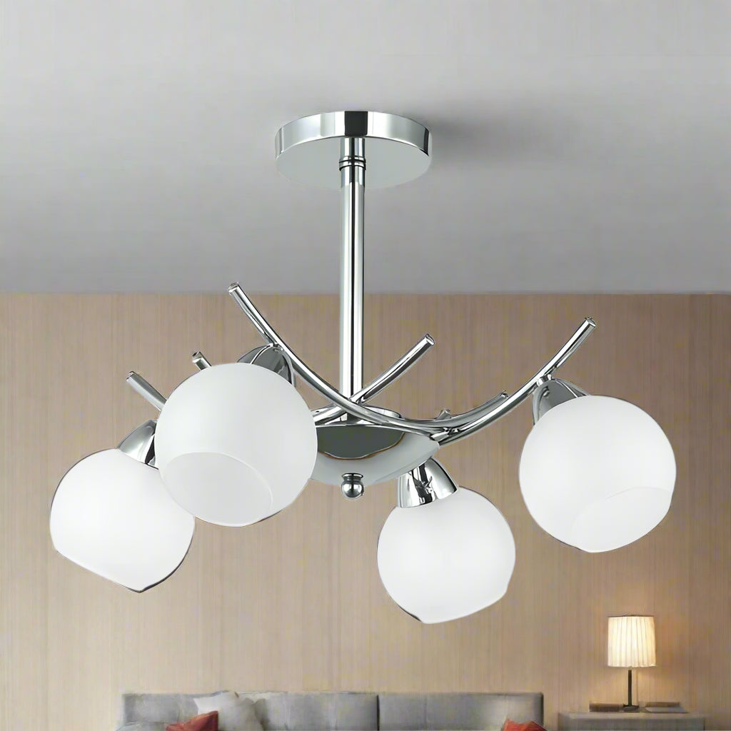 Modern ceiling light fixture with chrome finish and white glass shades on a white background