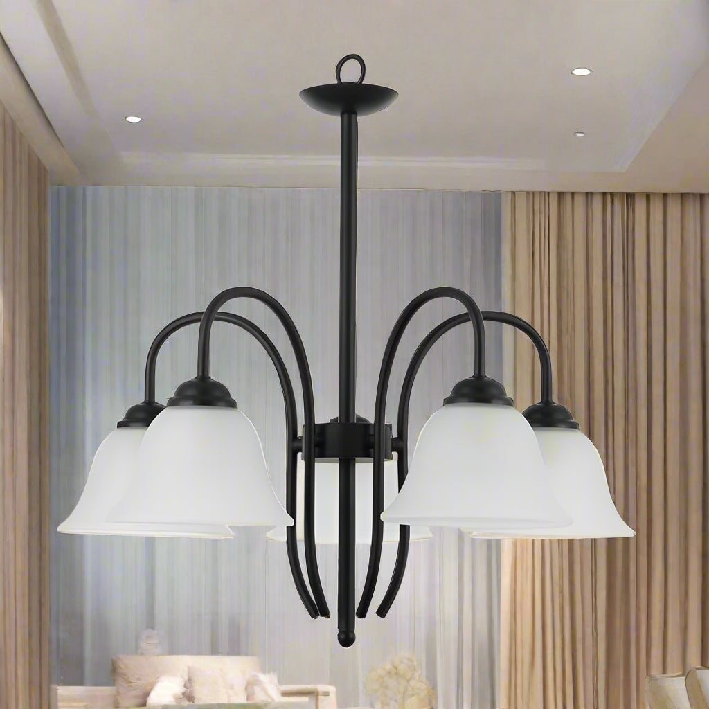 Black chandelier with three white glass shades on a white background