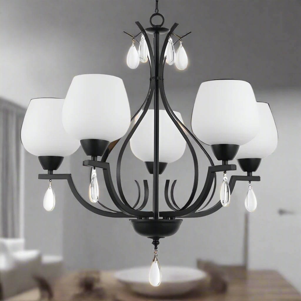 Black chandelier with white glass shades on a white background