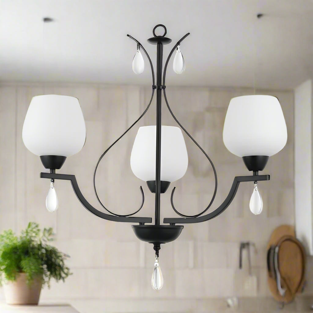 Black chandelier with white glass shades on a white background