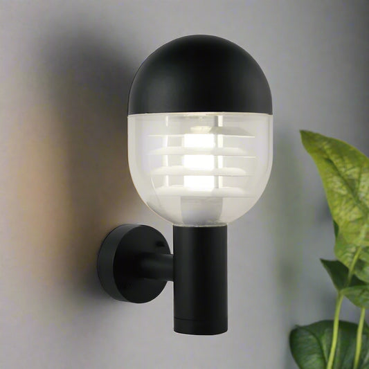 Black outdoor wall light fixture on a white background
